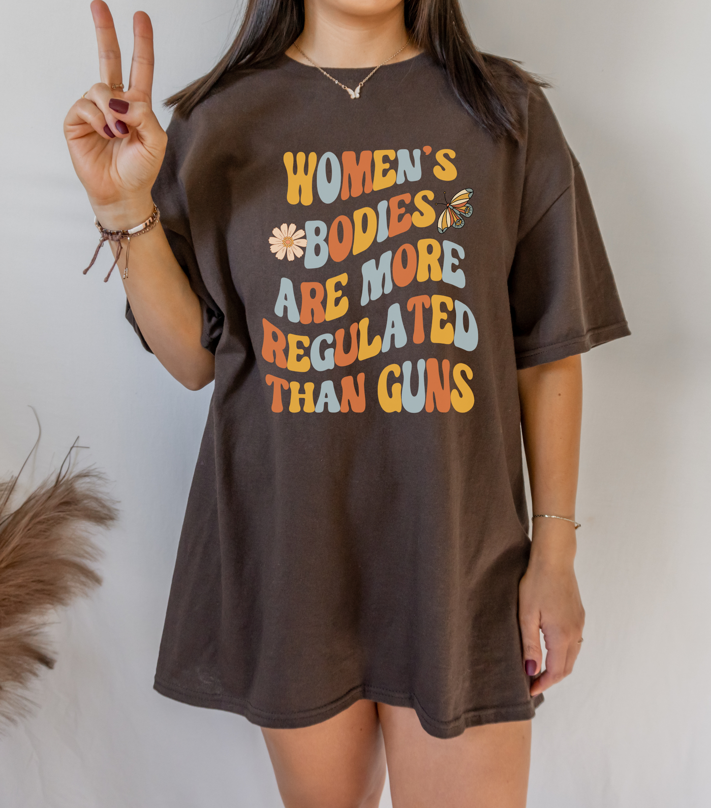 Women's Bodies Are More Regulated Than Guns Feminist Shirt